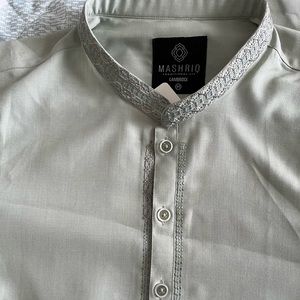 Light pistachio colored Embroidered kurta with matching shalwar.